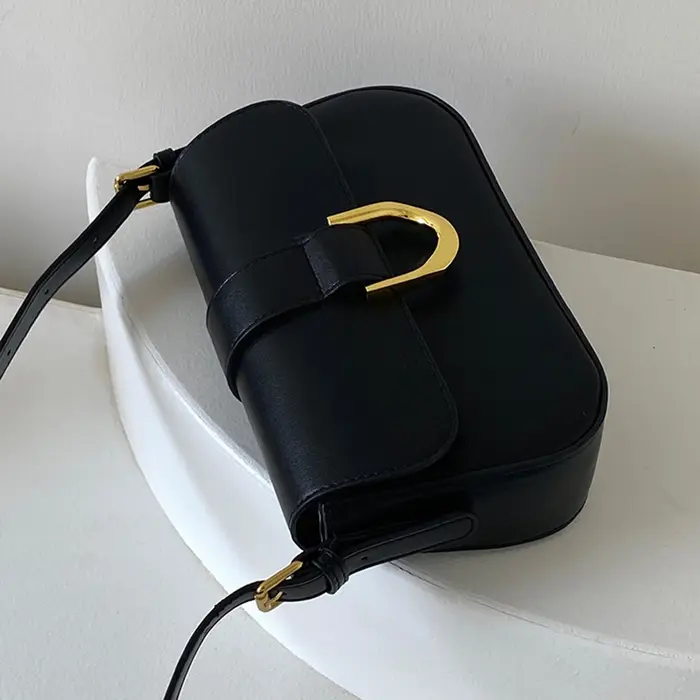 Sac messager en cuir verni pour femme