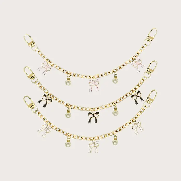 Breloque de sac à chaîne avec nœud tendance - Accessoires de sac suspendus avec pendentifs élégants pour la décoration de sacs