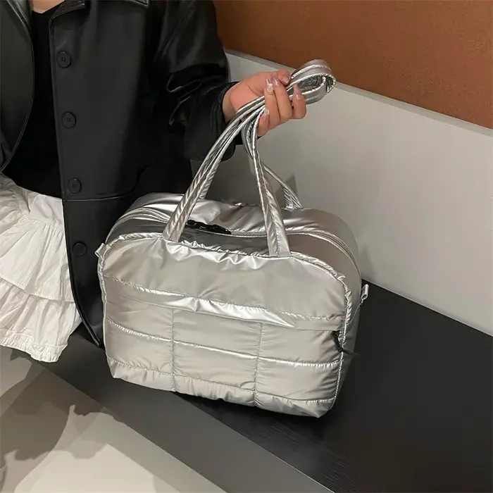 Sac de voyage matelassé de couleur unie