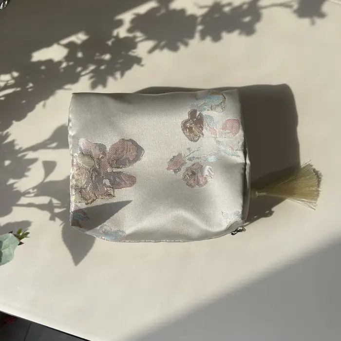 Sac à cosmétiques élégant à fleurs pour femmes