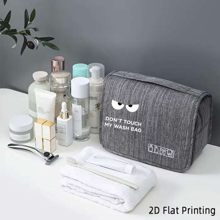 Sac de toilette suspendu multi-compartiments grande capacité avec motif 'Eyes DON'T TOUCH MY WASH BAG' et design à crochet