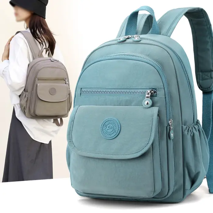 Sac à dos de voyage noir élégant léger et de grande capacité pour femme avec bretelles réglables