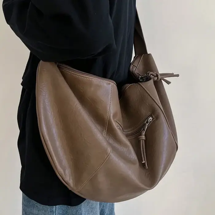 Sac à bandoulière élégant en PU en forme de boulette pour hommes, adapté aux sorties décontractées e