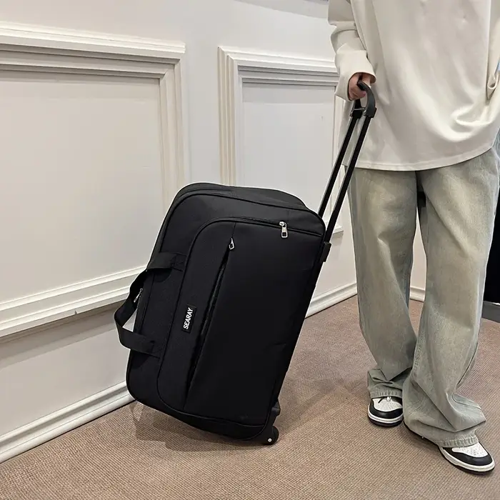 Sac de voyage avec poignée et roulettes, bagage pliable de grande capacité, adapté aux voyages, aux vacances et aux trajets quotidiens.