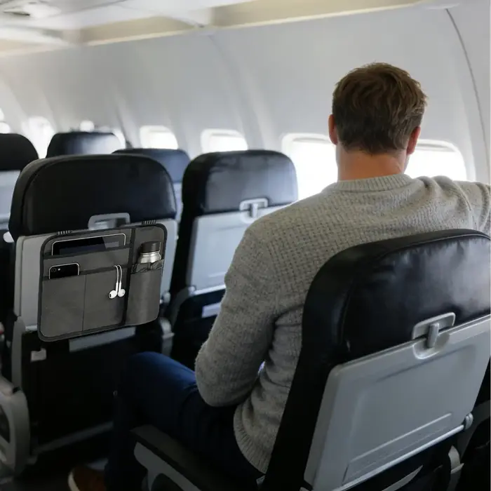 Sac de rangement pour siège d'avion
